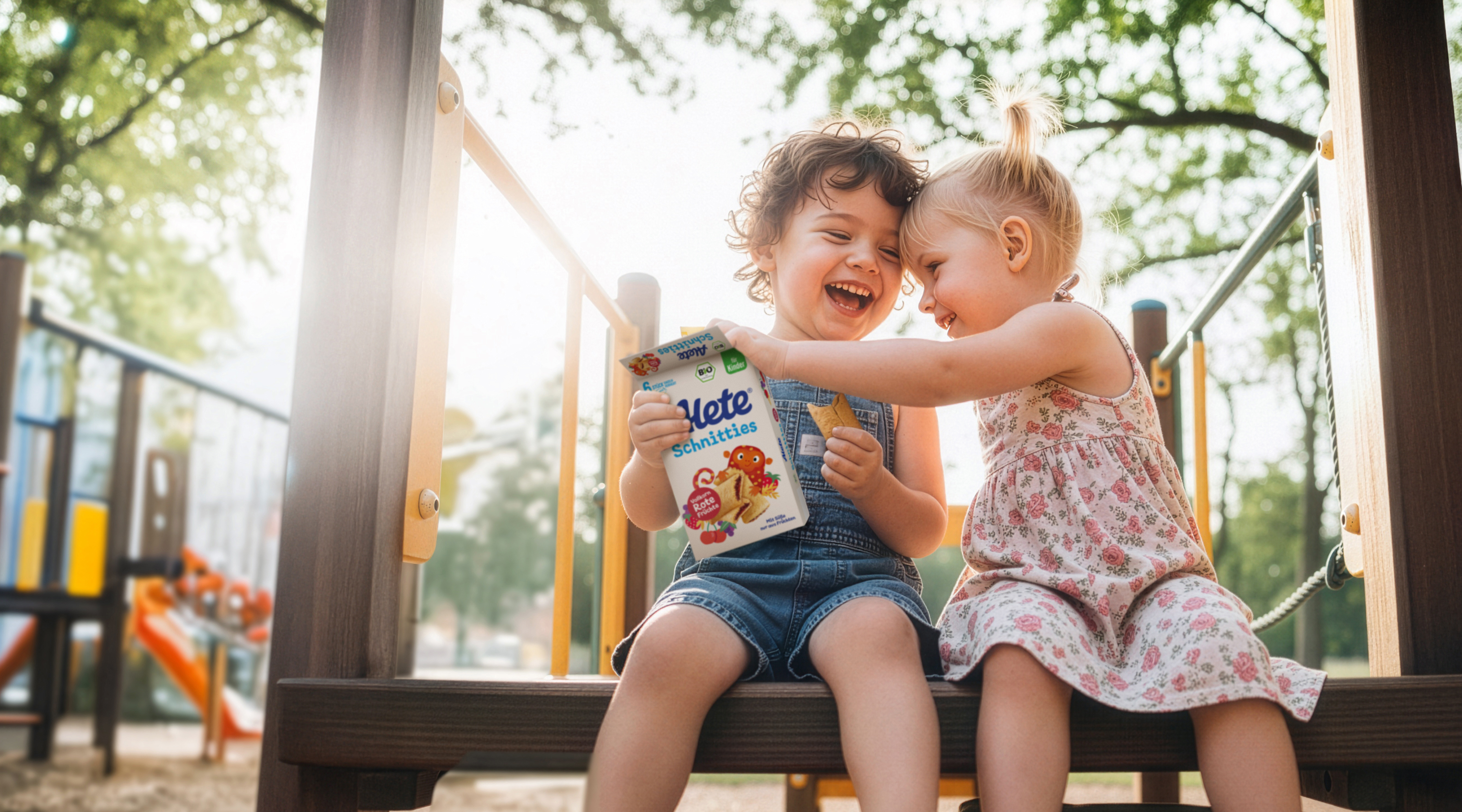 AI-generated: Two laughing children on a playground are sharing a bag of snacks. The boy is wearing jeans, and the girl is wearing a floral summer dress.