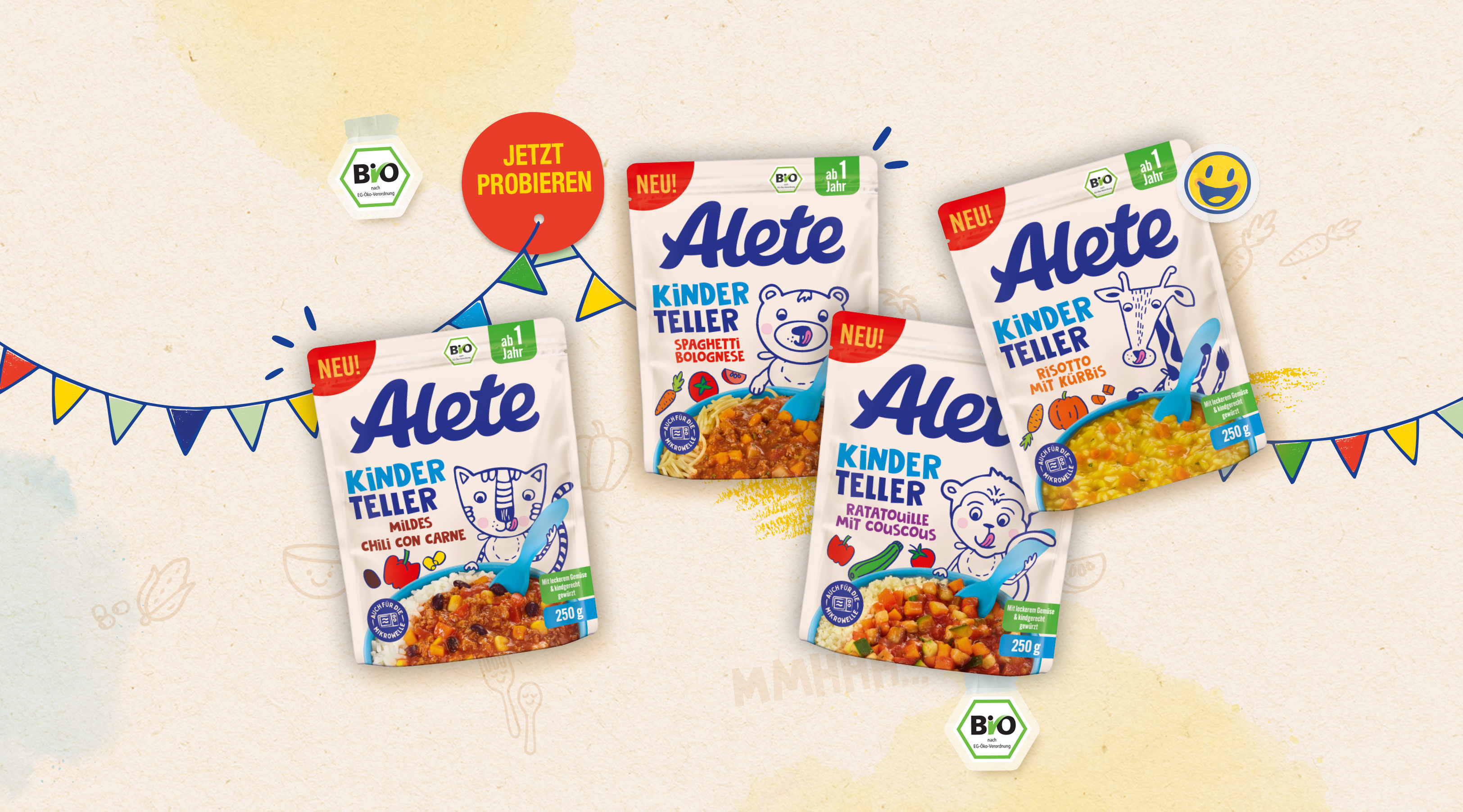 Alete Kinderteller Produkte in Bio-Qualität, mit verschiedenen Geschmacksrichtungen wie Spaghetti Bolognese und Ratatouille, dekoriert mit bunten Fahnen.